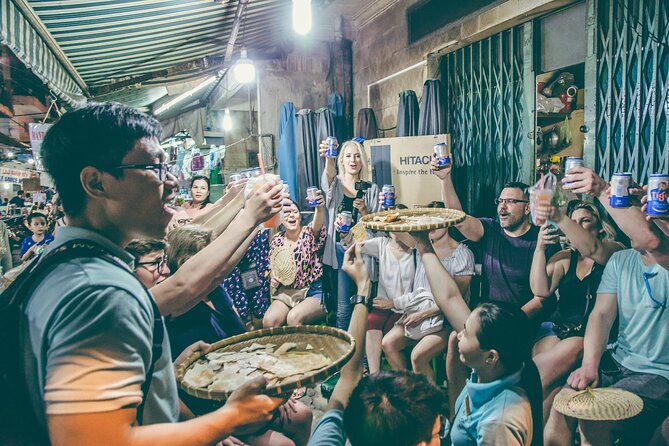 12 Tasting Street Food & Sightseeing By Scooter with Student - Riding across five districts