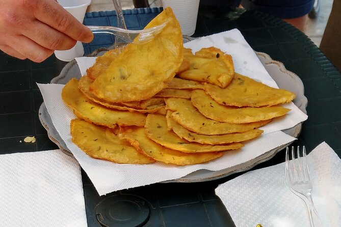 3-hours Street Food Bike Tour in Palermo - The Wall of Legality adds a serious note