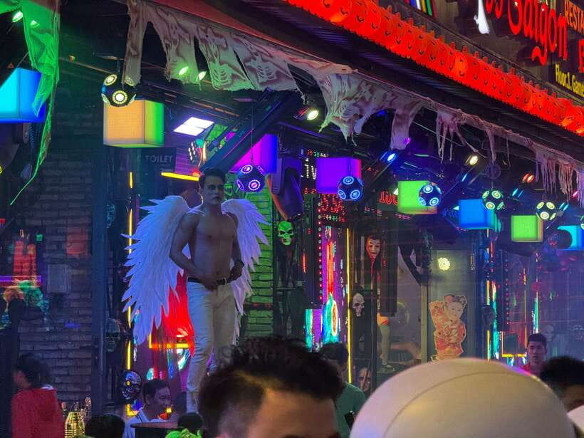 Acoustics Live Music And Saigon Night Life Street Food Tour - Walking Through Alleys and Finding Night Views