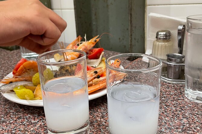 Athens Street Food Markets and Hidden Gems Experience - Tasting Greek products at the market