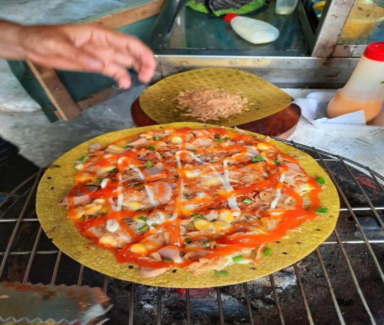 Authentic Walking Street Food Tour in Ho Chi Minh City - Walking through Saigon’s back alleys
