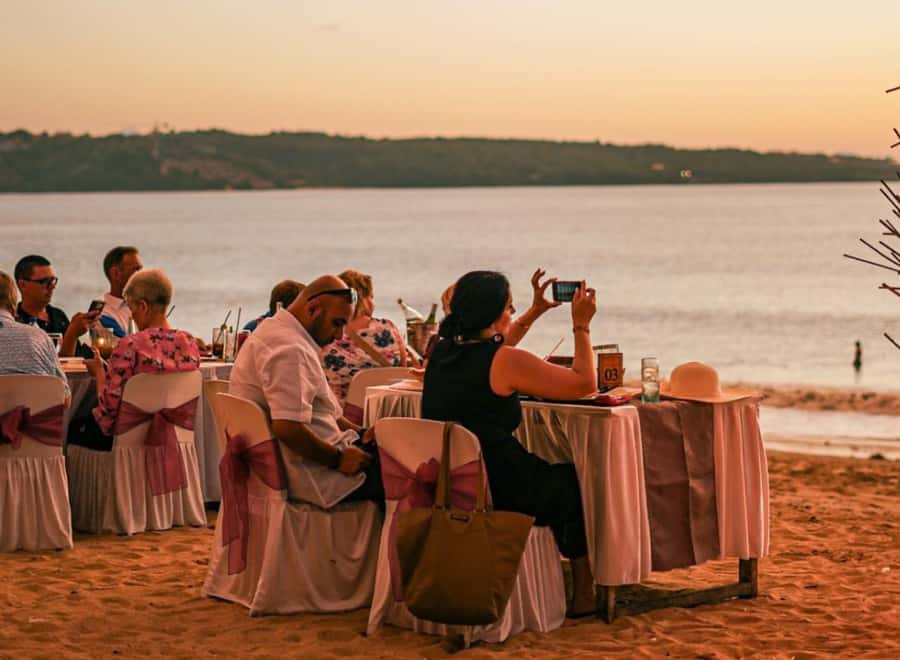 Bali: Jimbaran Seafood Market Tour with Sunset Dinner - Walking through Jimbaran Market