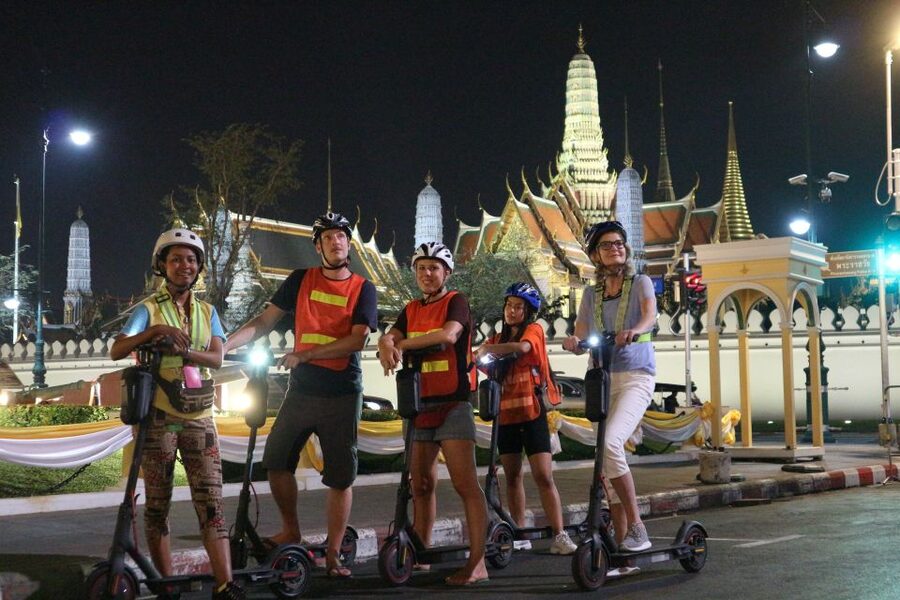 Bangkok: E-Scooter Night Tour with Local Street Food - Wat Arun after dark and the Chao Phraya ferry