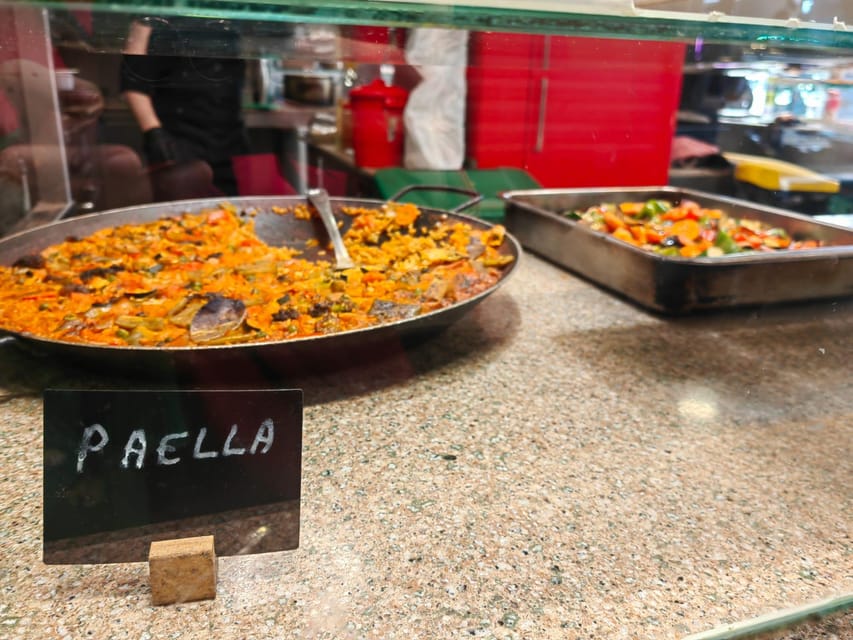 Barcelona: Local Market & Street Food Walking Tour - Meeting Joan Miró’s mosaic outside Liceu