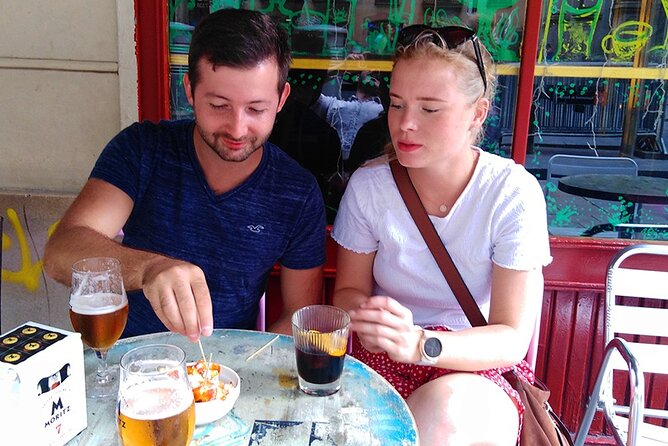 Barcelona Street Food Tour with Local Market & City Center Visit - Plaça del Rei and Roman-era Barcelona