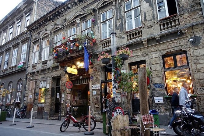 Budapest Ruin Bars Evening Walking Tour with Drinks & Street Food - The first bars: from famous to less obvious