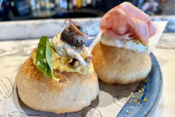 Camden Market Food Tour of 7 Tastings, Gin, Street Food & More - Three savory tastings broaden the menu