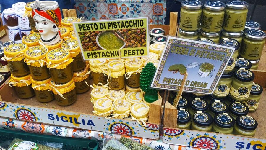 Catania Street Food Tour: Fish Market & City Centre - Arancini, fried fish, and Catania on the plate