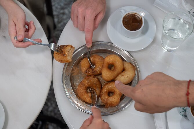 Classic Athens Food Tour with Local Drink & Market Visit - Pace, route, and finishing in Monastiraki