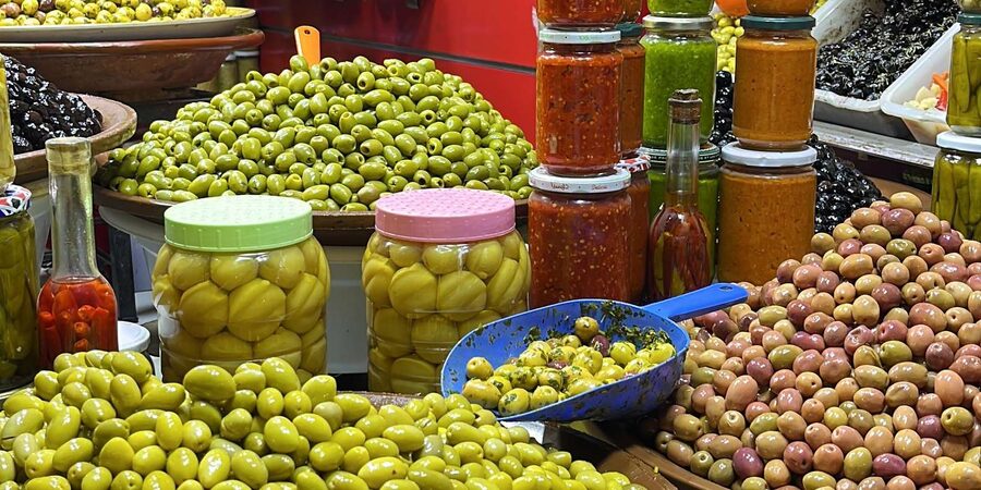 Discover Marrakech Street Food with a Local Guide - Walking through the Medina, with some driving
