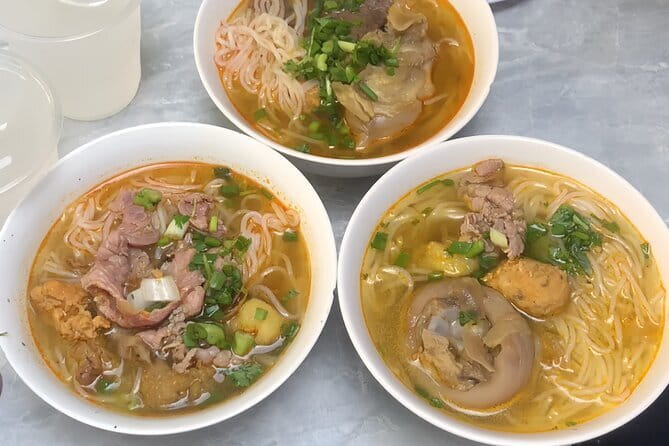 E biking Night Street Food Tour with Local Guide - Nem Lui and Hue-style Banh Khoai
