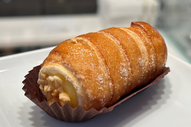 Eating Milan Street Food Tour with Guided Tasting and Sightseeing - Piazza del Duomo and the city’s grand center