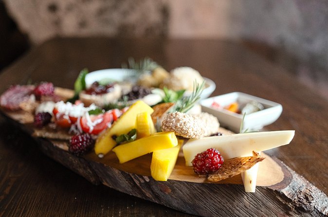 Etna Urban Winery - Tasting with Street Food Platter and vineyard - Inside the 18th-Century Palmento