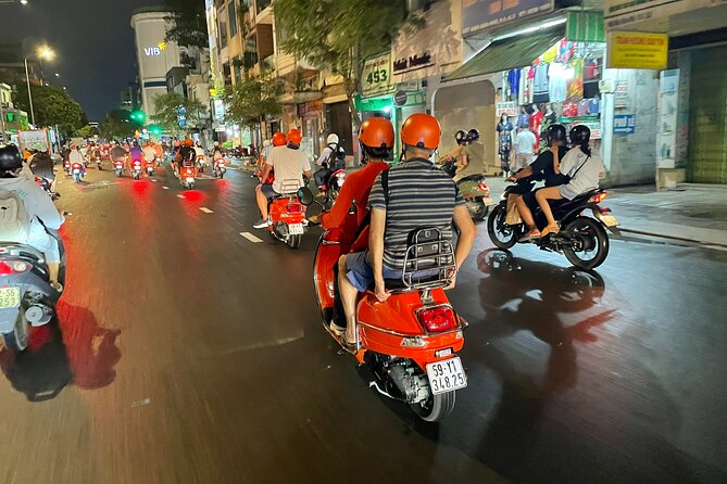 Female Riders Vespa Night Street Food + Train Street food 4 Hours - A quiet ride around Ba Dinh Square