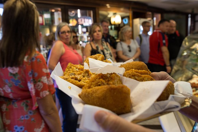 Gastronomic Street Food Tour of Catania - Arancini and cipollina on Via Etnea