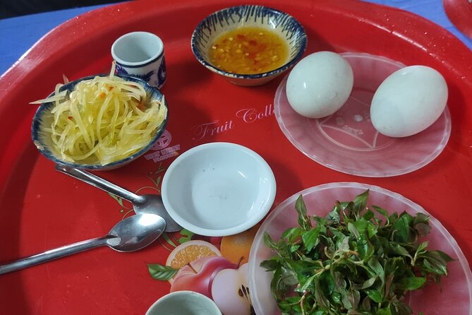 Half-day Private Street Food Tour in Hoi An - The optional balut challenge at BIDV ATM