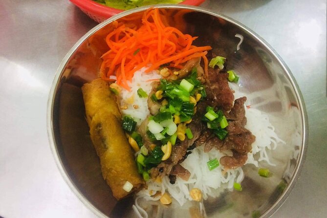 Half-Day Unseen Street Food of Saigon Adventure Tour - Ho Thi Ky Flower Market in District 10