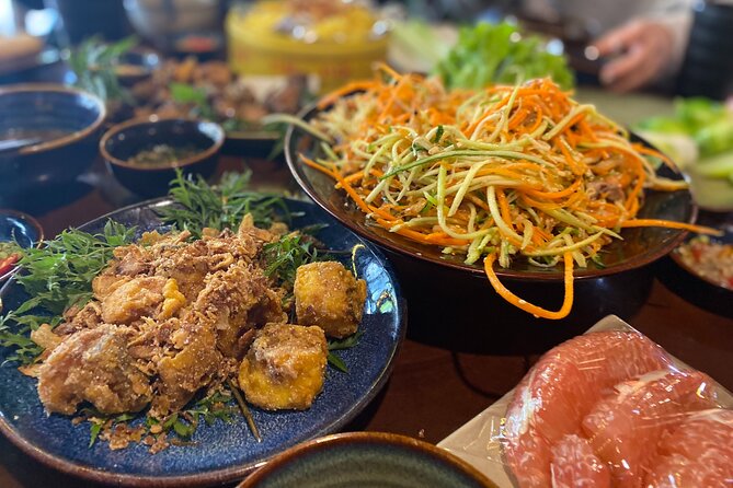 Hanoi: 7 Tasting Street Food Walking Tour and Train Street - Hoan Kiem Walking Street and the evening atmosphere