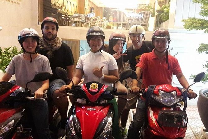 Hanoi City Street Food Night Tour by Motorscooter - Leaving central Hanoi on two wheels