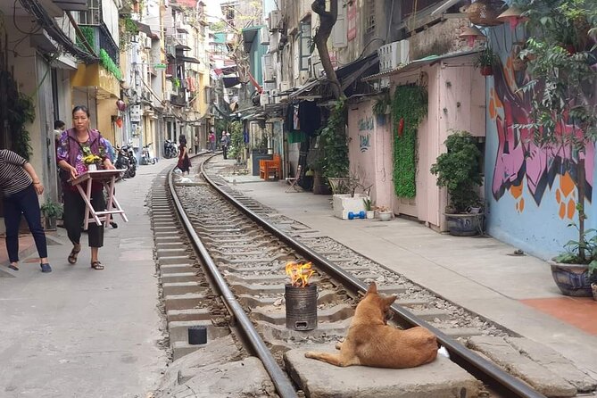 Hanoi Michelin Star Street Food Walking Tour & Train-Street - Banh Xeo, street desserts, and a cold bia hoi