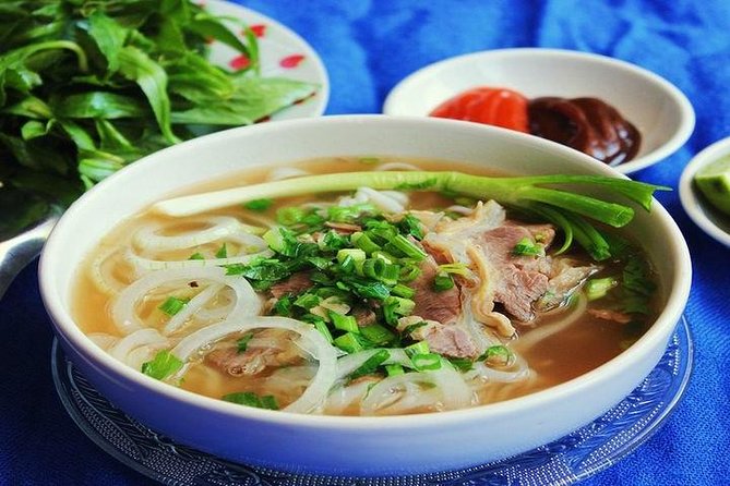 Hanoi Night Market and Street Food Tour - Music, performances, and the social side of Hanoi