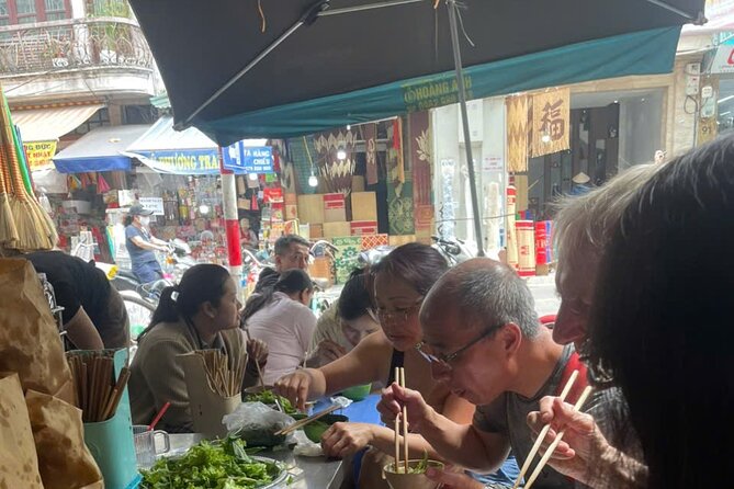 Hanoi Street Food Tour by Motorbike or Walking with Local Guide - Phung Hung Mural Street brings the city into view