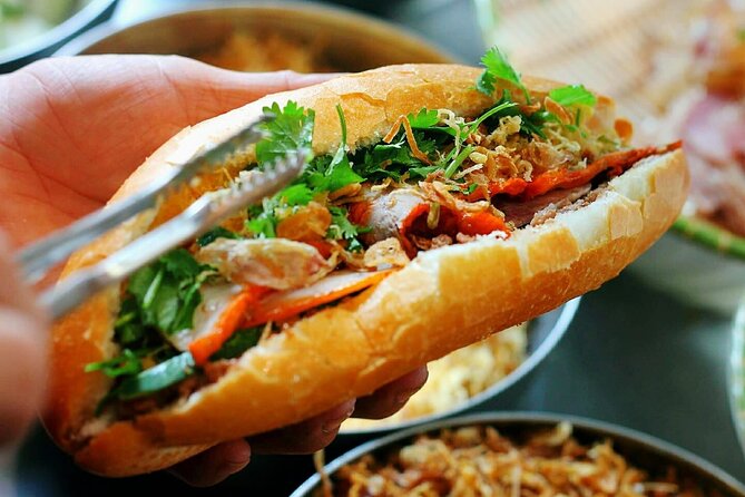 Hanoi Street Food Tour Taste 6 Local Dishes and Drinks - Banh mi and fruit close the food portion