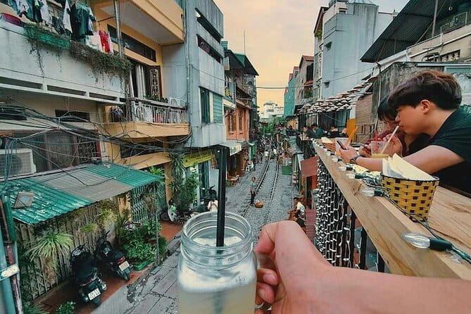 Hanoi street food walking and train street visit - Local stories between the food stops