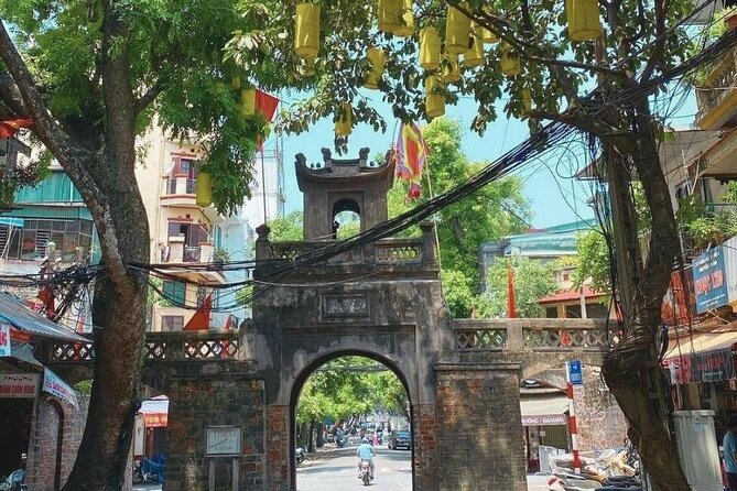 Hanoi Train Street Food Walking Tour - Phung Hung Mural Street recalls an older Hanoi