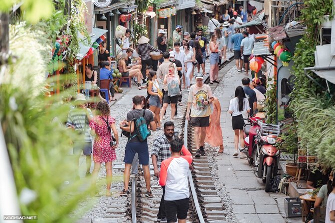 Hanoi Vespa After Dark Street food + Train Street+ Live Music - Long Bien Bridge and the Red River view