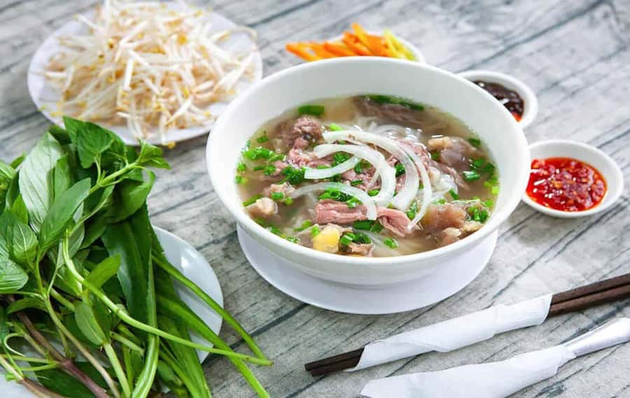 Hanoi: Vietnamese Street Food Tour with Local Guide - Hanoi food lessons before the tasting begins