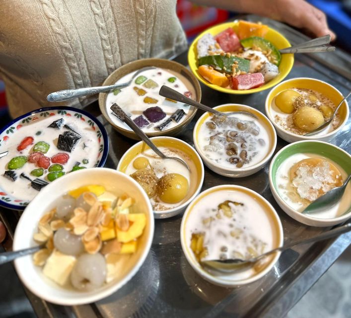 Hanoi: Vietnamese Street Food Tour with Local Guide - Walking through Hanoi after dark
