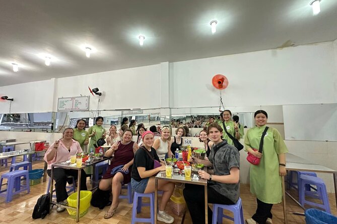 Ho Chi Minh City: Motorbike Street Food Tour with 12 Tastings - Second stop: alleys and local food spots