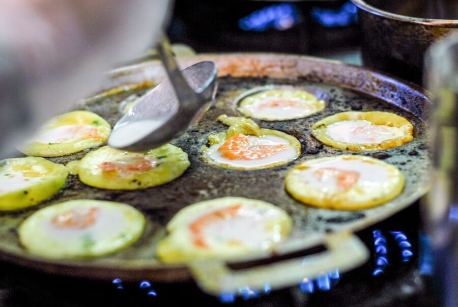 Ho Chi Minh City: Private Street Food Motorbike Tour - District 5, coconut ice cream, and the fashion street