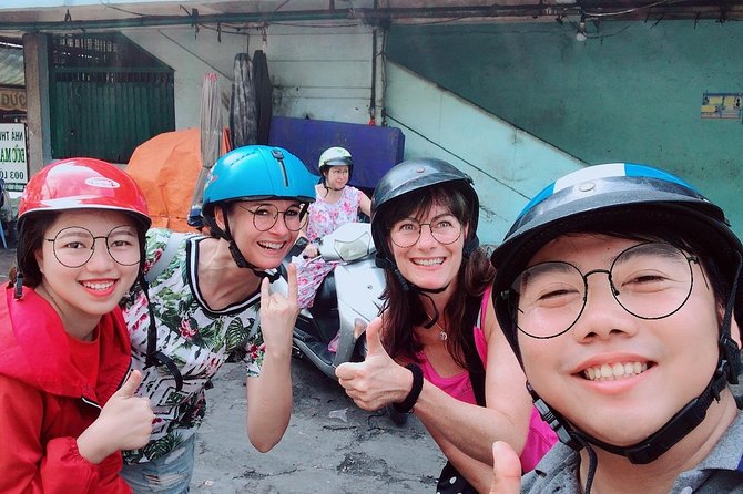 Ho Chi Minh city Street Food by scooter tour | female driver - The first ride through local Saigon