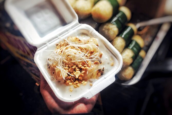 Ho Chi Minh City Street Food Tour & Sightseeing By Motorbike - Grilled banana and coconut sauce in District 10