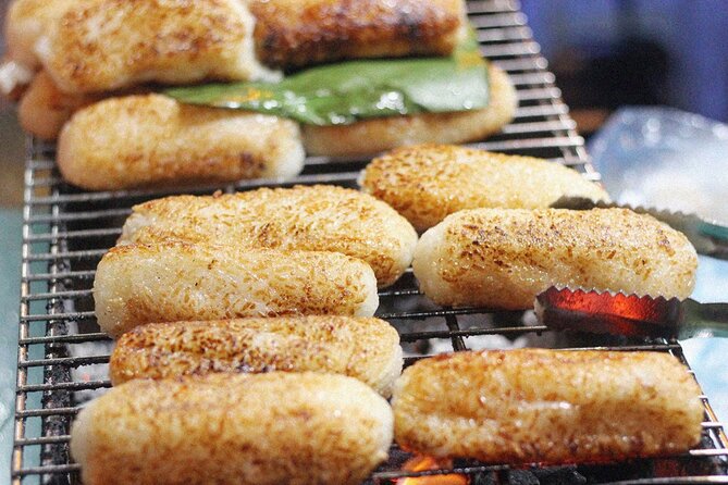 Ho Chi Minh City Street Food Tour & Sightseeing By Motorbike - Nguyễn Thiện Thuật apartment buildings and bánh khọt