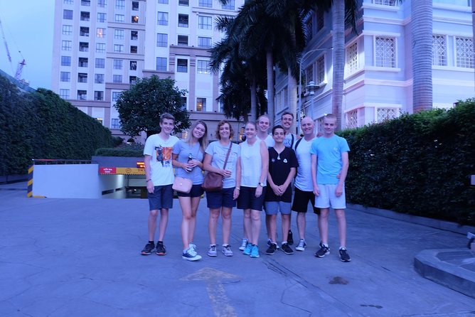 Ho Chi Minh City: Street Food Walking Tour with 12 Tastings - Sweet finishes: grilled banana sticky rice cake and caramel flan