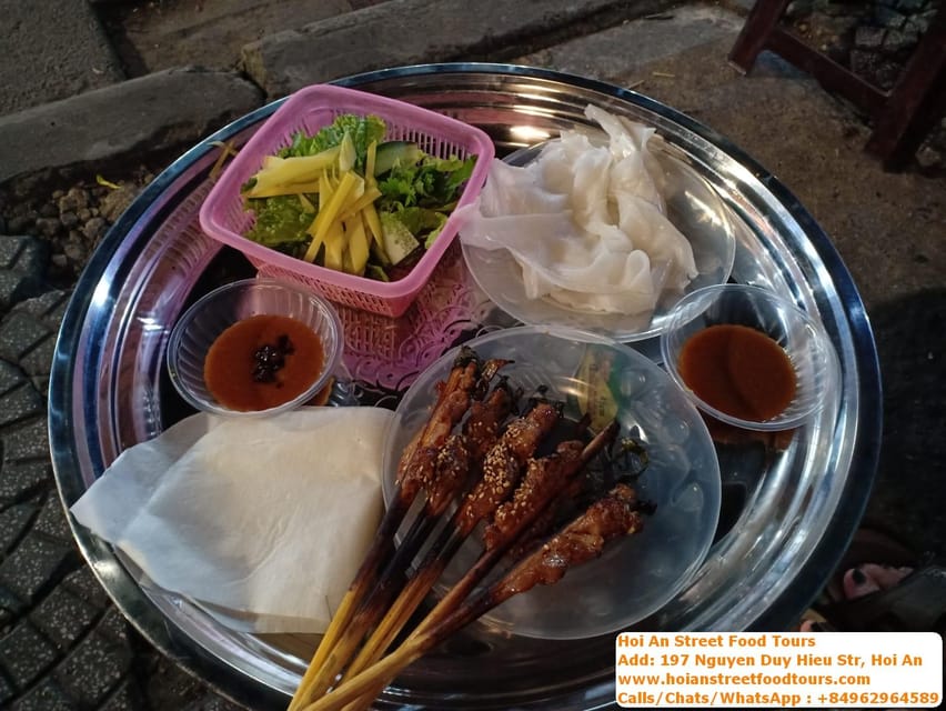 Hoi an food tour with 8 different street food tasting - Quang Noodles with shrimp, pork, herbs, and peanuts