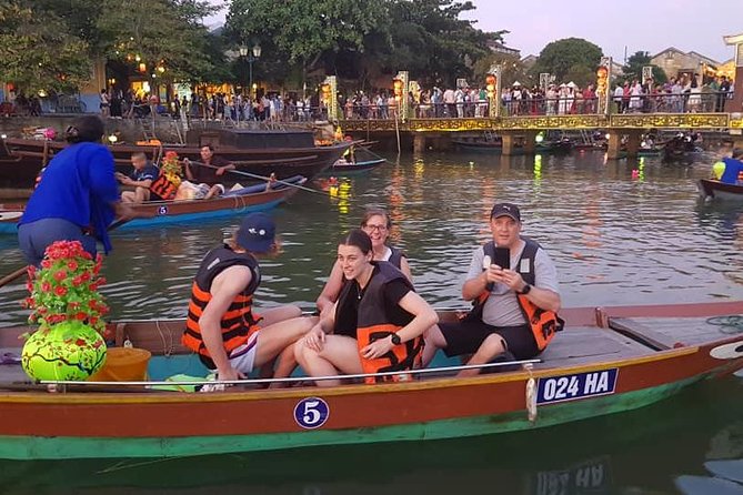 Hoi An Nightlife Tour with Hoi An Ancient Walking Tour, Boat Ride, Night Market - Walking through Hoi An Ancient Town