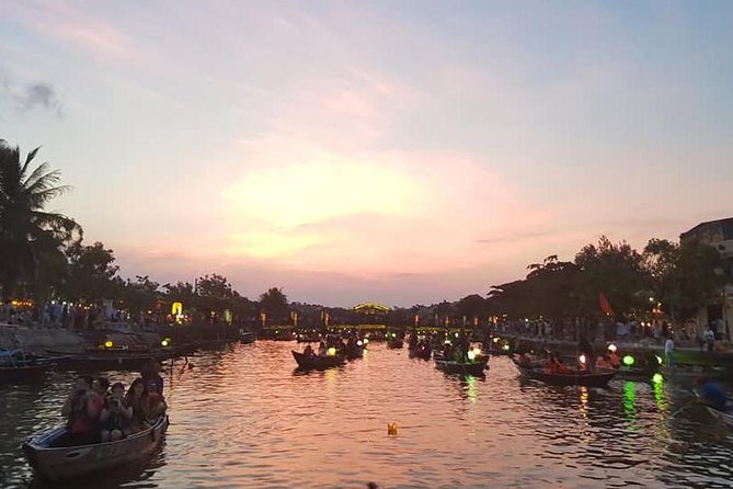 Hoi An Nightlife Tour with Hoi An Ancient Walking Tour, Boat Ride, Night Market - Lanterns, market food, and the evening change