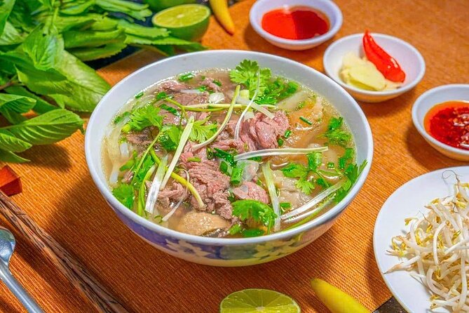 (HOT) Hanoi Guided Street Food and Train Street Tour with Local - What the $21.02 price really covers
