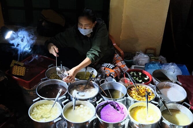 Hue Night Tour: Cyclo, Street Food & Folk Music on Perfume River - Key points at a glance