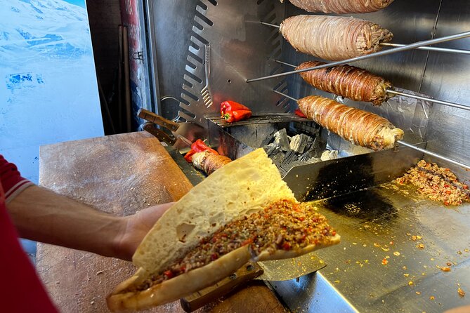 Istanbul Guided Street Food Tour Around European and Asian Sides - Fish wrap in the back streets of Karaköy