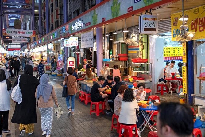 Jagalchi Sunset Cruise and Night Market Tour in Busan - Walking through Jagalchi Fish Market