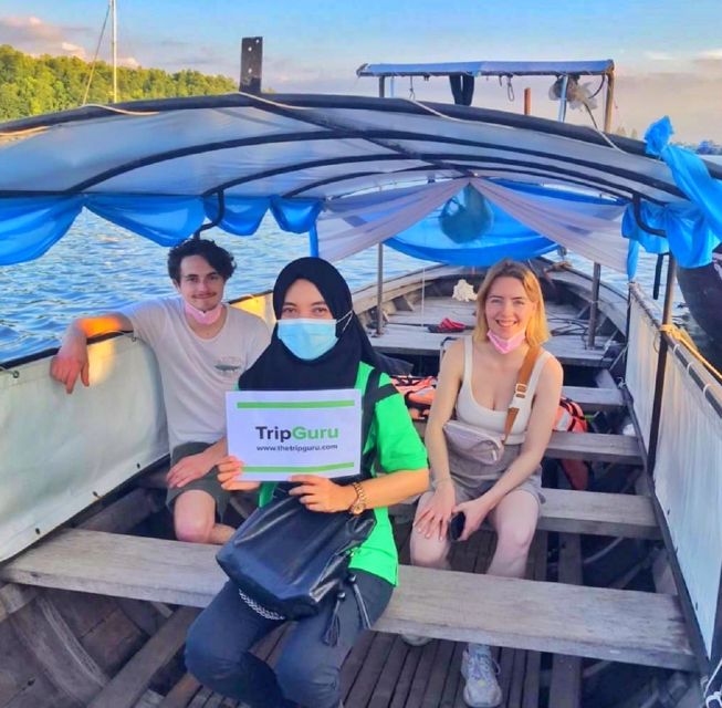 Krabi: Private Sunset Boat Trip and Night Market Tour - Leaving Krabi by long-tail boat