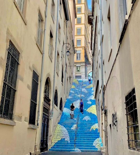 Lyon: Street Art & Street Food Tour - Croix-Rousse, viewed through street art