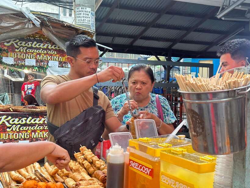 Manila Street Food and Drinks with Tuktuk Experience - Savory street food: kwek-kwek, siomai, and soup