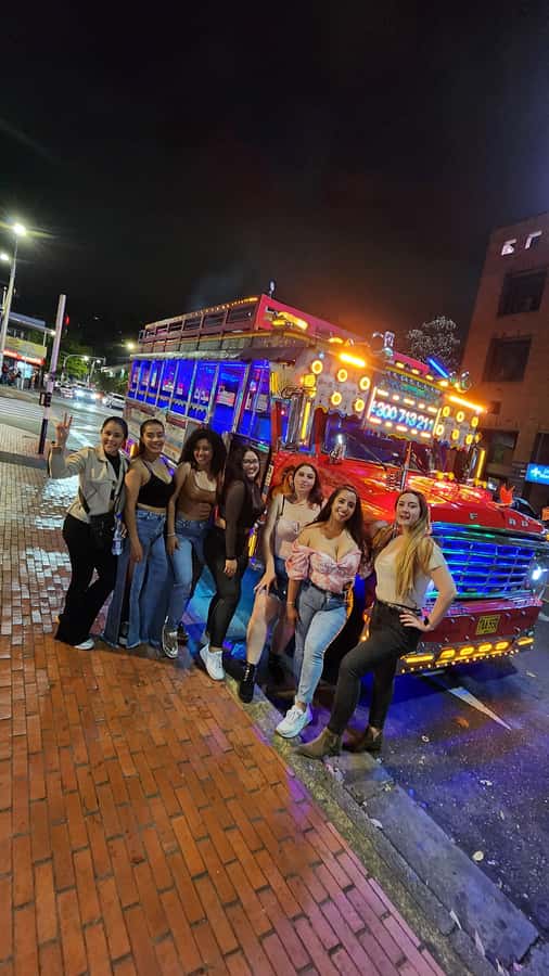 Medellin: Party Bus with DJ & Street Food Tastings - Starting in El Poblado at Mall Gastroturístico Punto de Encuentro