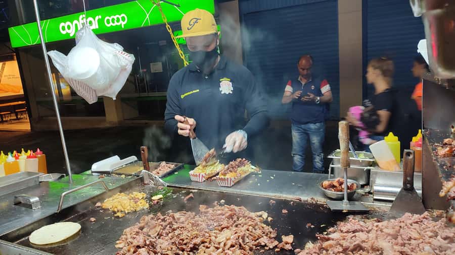 Medellin: Street Food and Poblado Rooftop Tour with a Local - Five stops, from arepas to filling street food
